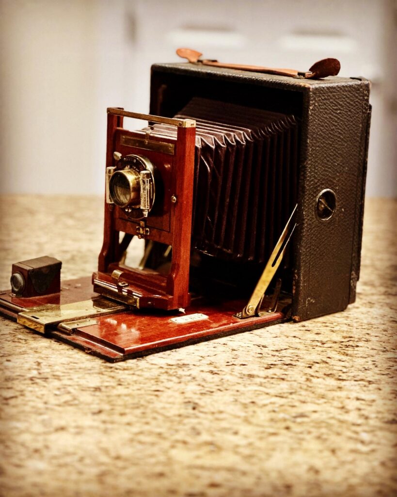 color photograph of an old format camera on a tble