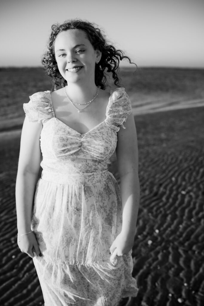 black and white photo of girl on the beach at Topsail Island, NC