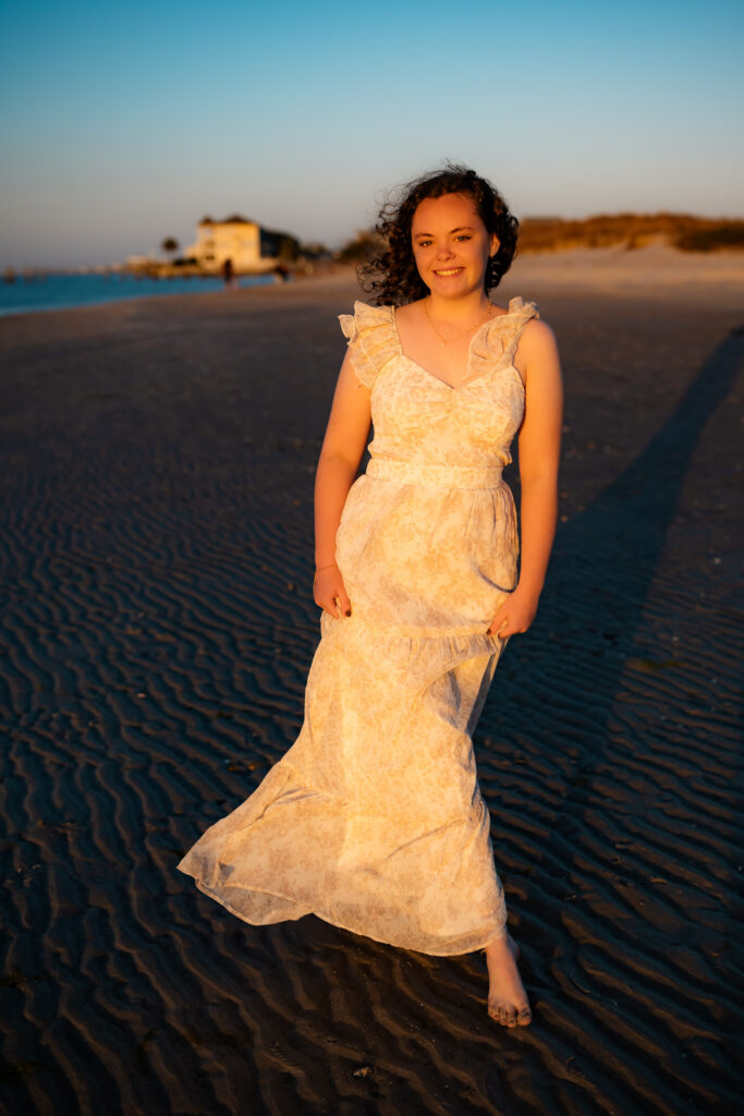 sunset photo of girl on a beach at sunset at Topsail Island, NC