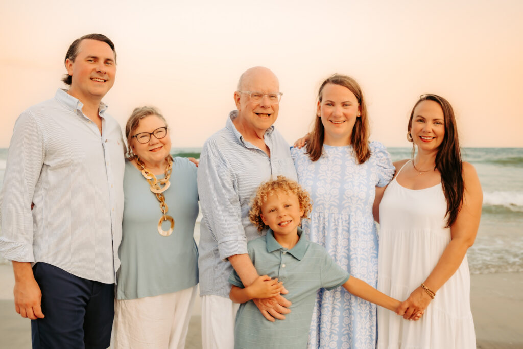 color photo of family on the beach